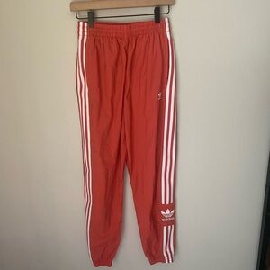 adidas Scarlet Joggers with White Stripes